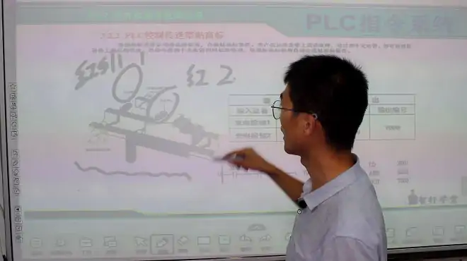 PLC指令系统第18讲，PLC控制实际案例分析，控制传送带贴商标